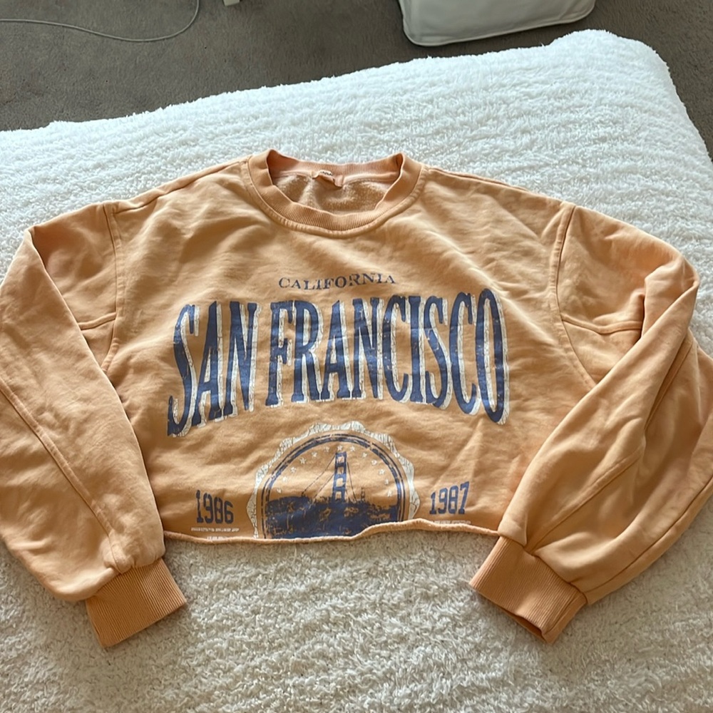 garage orange cropped crewneck